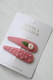 Haarspeldjes Roos en blad + stippen zalmroze