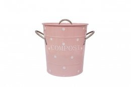 A round, pink compost bin with white polka dots, measuring 21x19 cm, suitable for waste disposal.