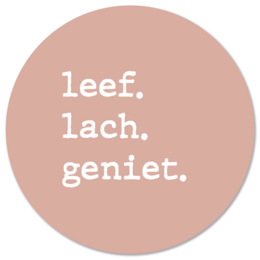 Round wall circle in salmon color with text "leef. lach. geniet." Available in various sizes from 12 cm to 140 cm, made of Forex or Dibond material.