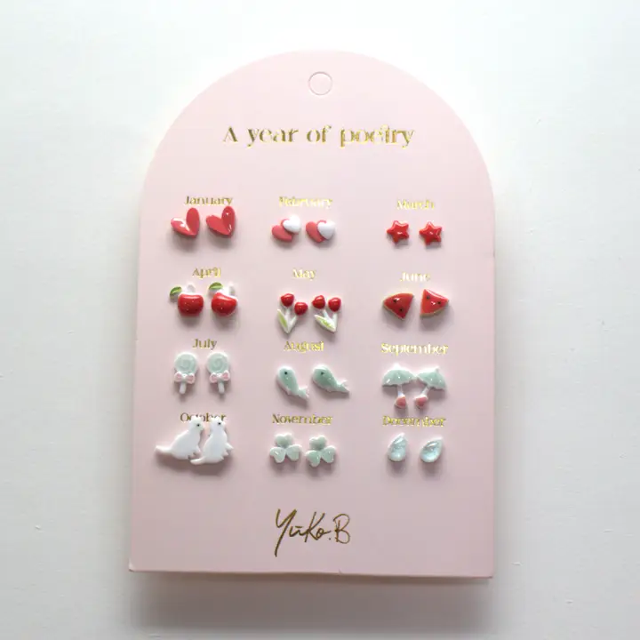 Card of 12 Earrings A Year of Poetry red English