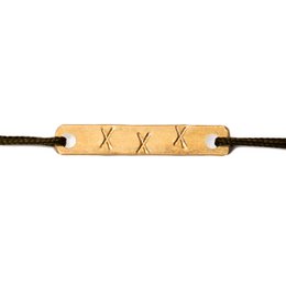 A gold-colored chain bracelet with a simple, elegant design featuring the text "Kisses from Amsterdam".