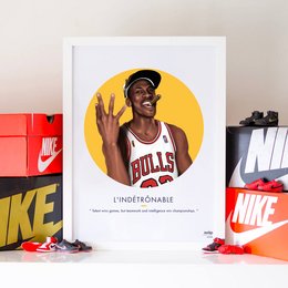 A poster featuring a stylized portrait of a basketball player wearing a Bulls jersey. The poster has the text "L'INDETRÔNABLE" which means "The Undefeated" in French. The poster is available in yellow, red, and gray color variants.