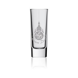 A small, clear glass shot glass with an etched design of a tower or spire, likely representing a landmark or architectural feature. The glass has a simple, elegant design that would be suitable for serving liqueurs or other small drinks.