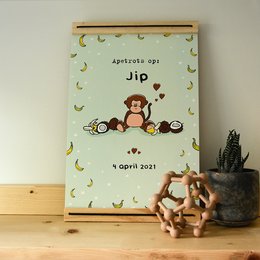 Colorful birth poster featuring a cute monkey design, perfect for decorating a baby's nursery or kids' room.