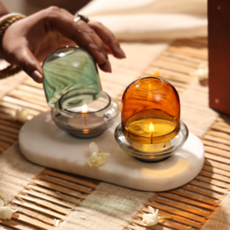 Borosilicate glass dome candle holder, amber and teal colors, minimalist design, tea light holder.
