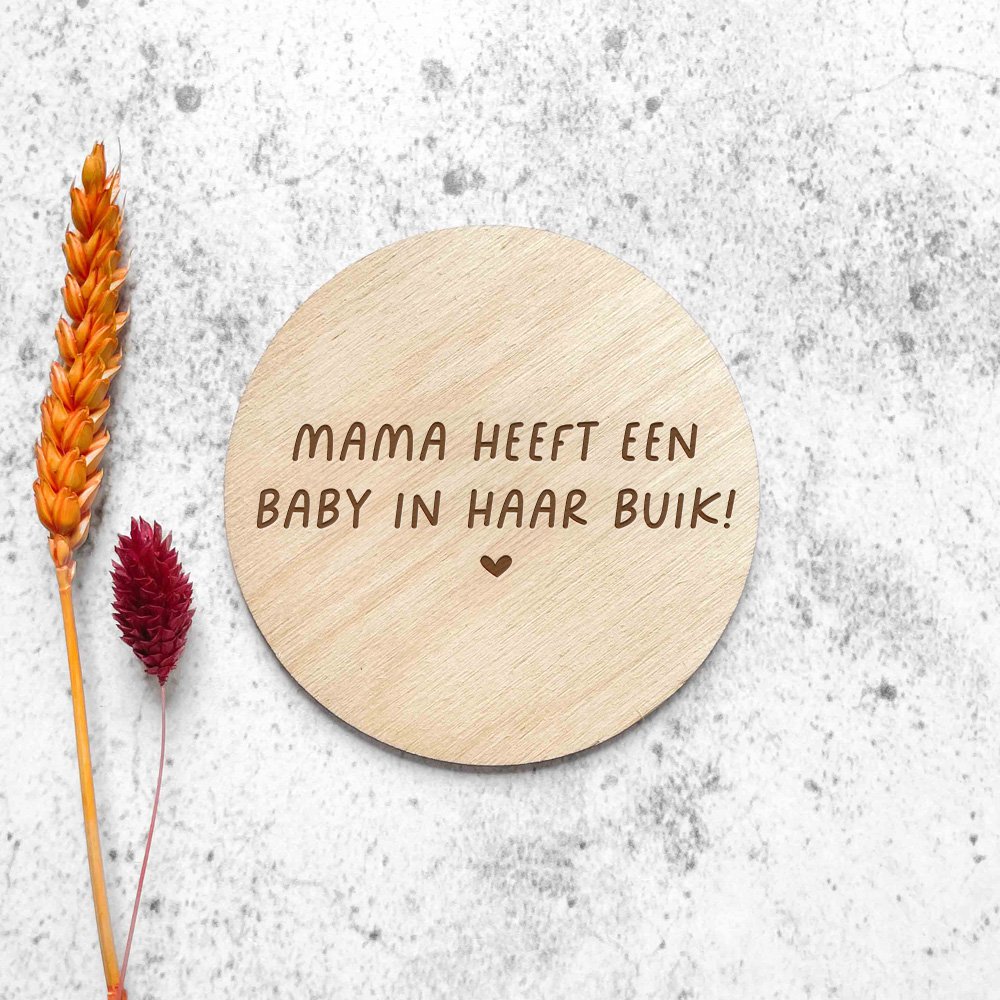 mom has a baby in the belly - wooden circle