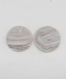 Elegant drop earrings with a swirling, marbled pattern in shades of gray and white. The earrings have a round, disc-like shape and a simple, minimalist design.
