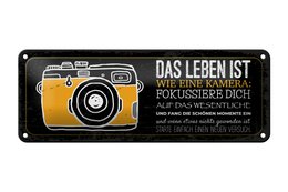Tin sign saying 27x10 cm Life is like a camera Focus on the essentials