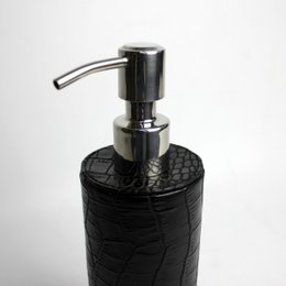 Round soap dispenser in crocodile look-black and stainless steel