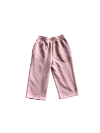 Pink pants for girls, available in sizes 8Y (128 cm), 10Y (140 cm), and 12Y (152 cm). Made of soft, comfortable material.