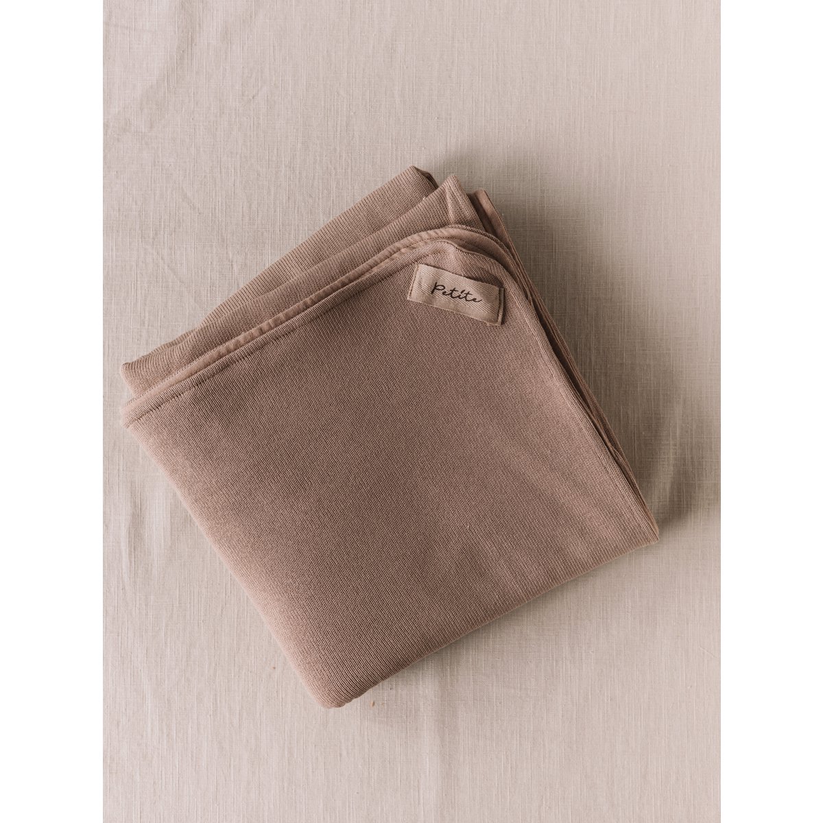 Gebreide + mousseline deken / donkerbeige