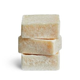 Amber-colored fragrance cubes made of natural materials, suitable for use as home decor or aromatherapy.