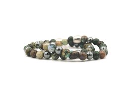 A set of two bracelets featuring a mix of green, gray, and white beads. The bracelets are designed for couples and have the text "MR. & MR." printed on them.