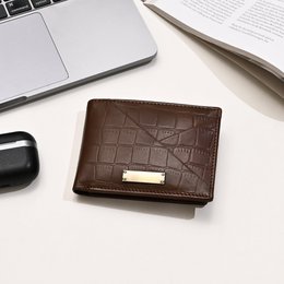  Brown croc-embossed leather wallet with slim, stylish design and functional features for men.