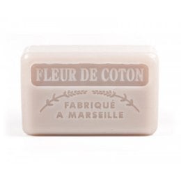 Handmade Marseille soap bar with cotton flower scent. Rectangular shape, light pink color.