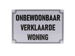  Retro-style wall plaque with Dutch text "Onbewoonbaar Verklaarde Woning" meaning "Uninhabitable Declared Dwelling". The plaque has a vintage, weathered appearance and is suitable for use in relief images or home decor.