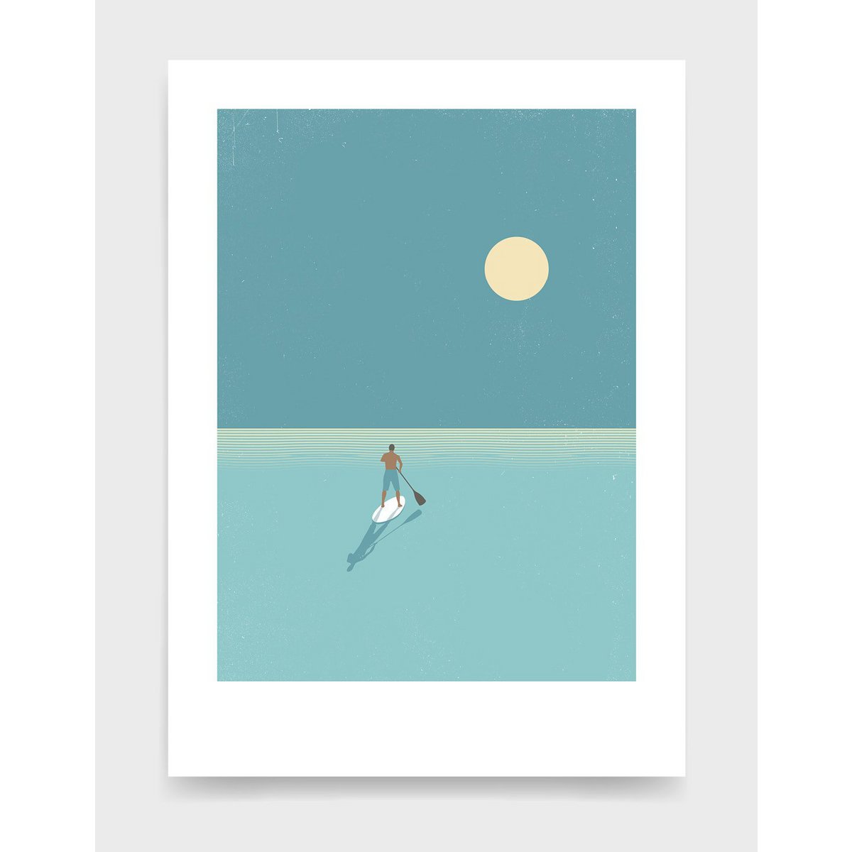 Paddleboarder at sunset