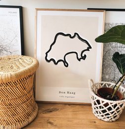 Wall art featuring a minimalist outline of the Netherlands. Available in various sizes from A4 to 50x70 cm. Suitable for home or office decor.