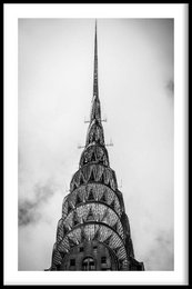 Black and white photograph of the Chrysler Building in New York City, available as a poster in various sizes and materials including poster, framed poster, canvas, and plexiglass.