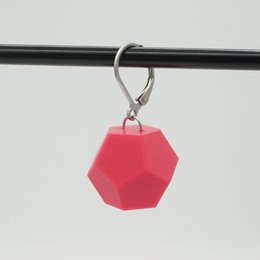 Geometric statement earrings in vibrant colors including magenta, galaxy purple, gold, galaxy blue, dark red, and jade green.