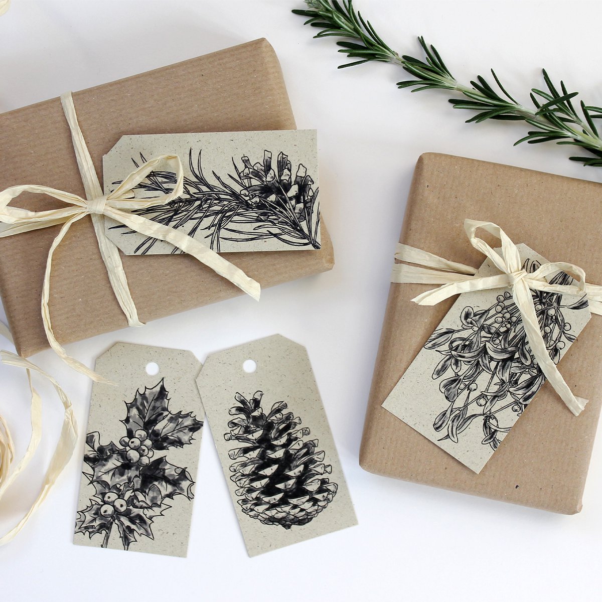 Gift tags made from grass paper, mistletoe