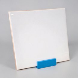 Rectangular oak wood tile holder with natural wood grain texture.