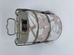 Soft pink floral patterned lunch box with stainless steel construction and multi-tier design for storing meals.