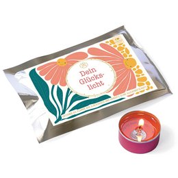 Colorful tealight candle set with floral design and text "Fortuna's Lucky Light". The set includes a tray and multiple tealight candles in a vibrant, nature-inspired color palette.
