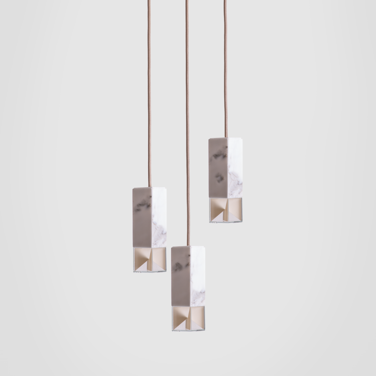 Lampada/Un Lampadario Trio in Marmo Calacatta