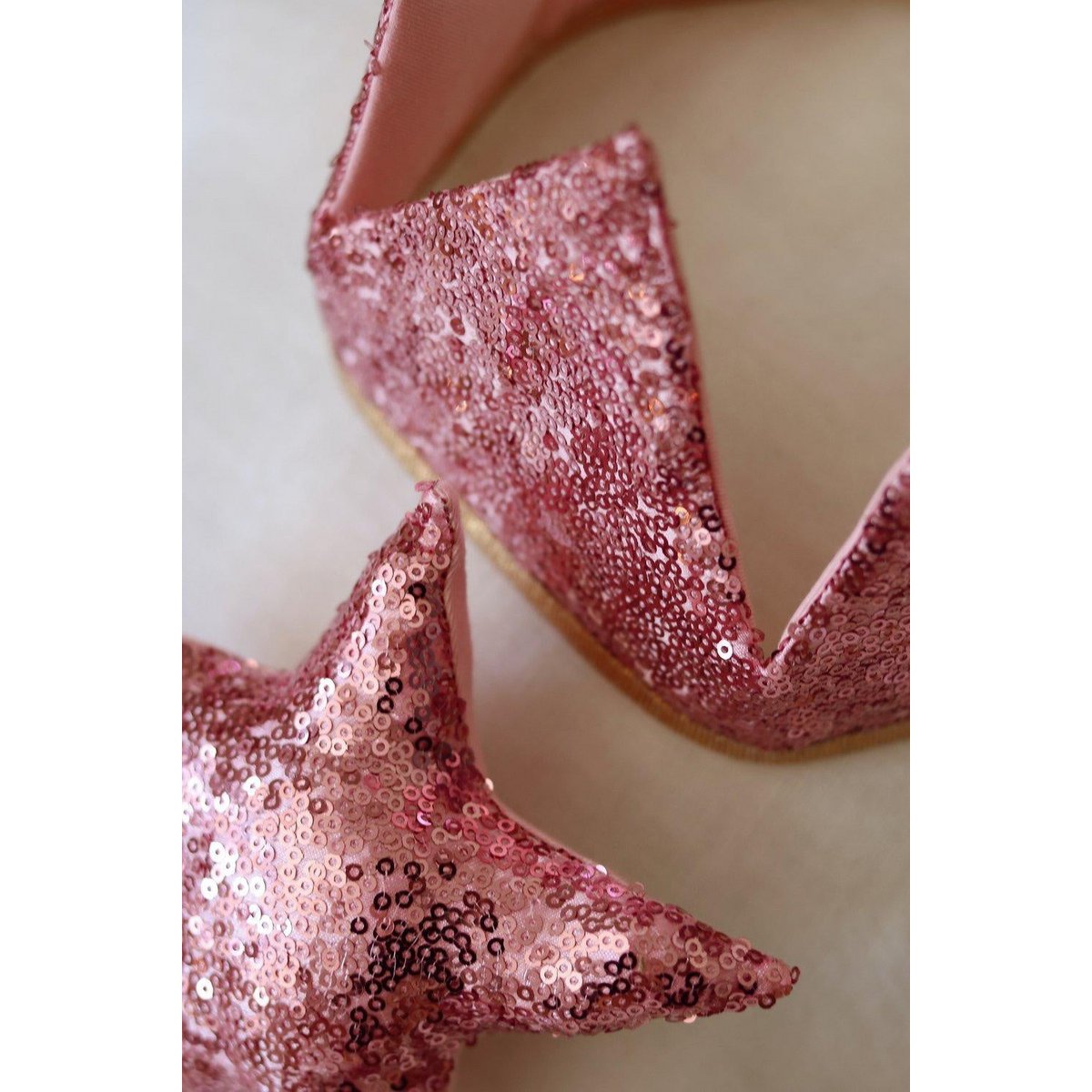 Kroon met "roze pailletten"