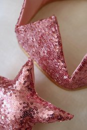 Kroon met "roze pailletten"