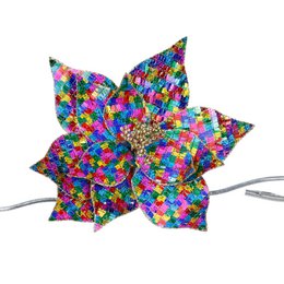 Colorful sequin poinsettia flower clip decoration, vibrant rainbow multi-colored sparkly festive ornament.