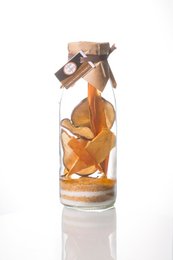 Pear and papaya flavored rum in a glass bottle with orange slices and a label that says "Dales Weiss".