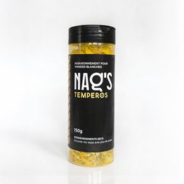 "Golden yellow spice mix in black cylindrical container with gold band, tempering blend"