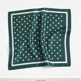 Satin look scarf with white polka dot print, available in green, navy, brown, and beige colors.