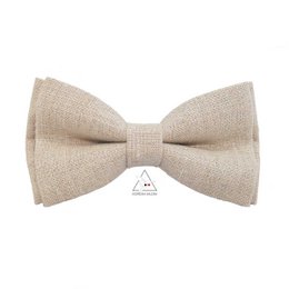 Floral and animal print bow tie with coral accents, suitable for formal or casual wear.
