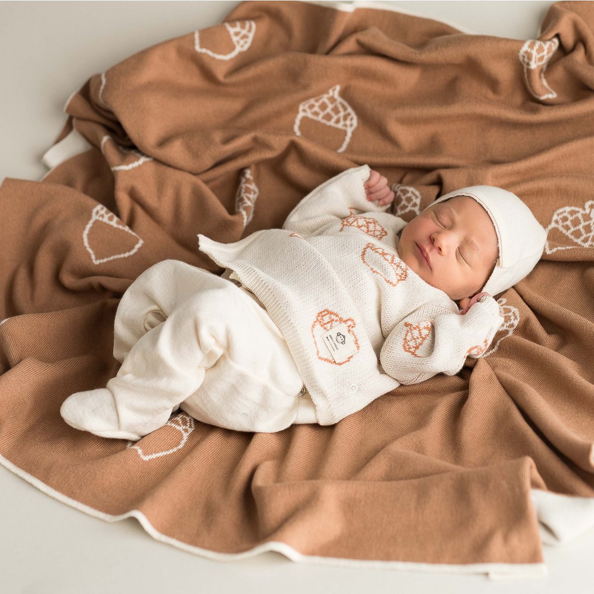 Babydecke Eichel ecru-braun