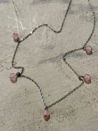 Delicate necklace with rose quartz beads, perfect for everyday wear.