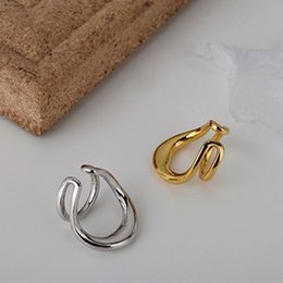 Doppelte Ohrklemme aus Gold und Silber
