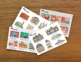 Illustrated postcards featuring landmarks and architecture of Lyon, France, including Place des Terreaux, Basilica of Notre-Dame de Fourvière, and Opéra de Lyon.