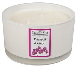 A large, round, white candle with a 3-wick design. The candle is scented with patchouli and ginger, creating a warm and earthy aroma.