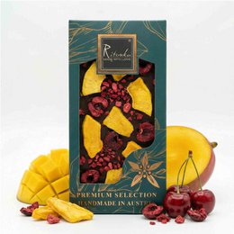 Premium dark chocolate bar with mango and cherry pieces. Handmade in Austria.