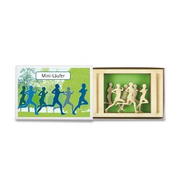 A wooden framed artwork depicting silhouettes of runners in various poses, with the text "Mini Life" displayed. The artwork is set against a backdrop of green trees and a grassy field.