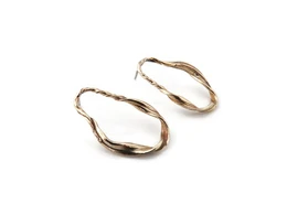 Økologiske bronze øreringe – skulpturelt design