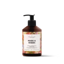 Hand soap with a floral scent of hugs and kisses, featuring a pump dispenser for easy use.