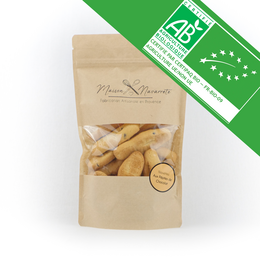 Organic chocolate chip cookies, 100g. Rectangular-shaped cookies with visible chocolate chips. Packaged in a kraft paper bag with green organic certification label.