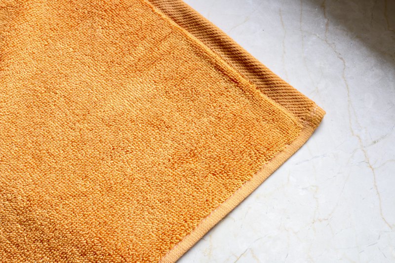 Set di asciugamani color cognac terroso