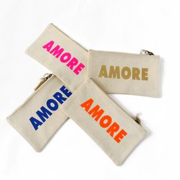 Kosmetyczka AMORE - napis w wielu kolorach
