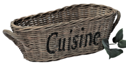 Woven wicker basket labeled "Cuisine" with various bread and baking items inside.