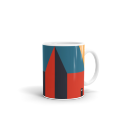 Colorful geometric pattern mug with abstract triangular design in shades of blue, red, and yellow.